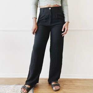 black linen pleated wide leg trousers